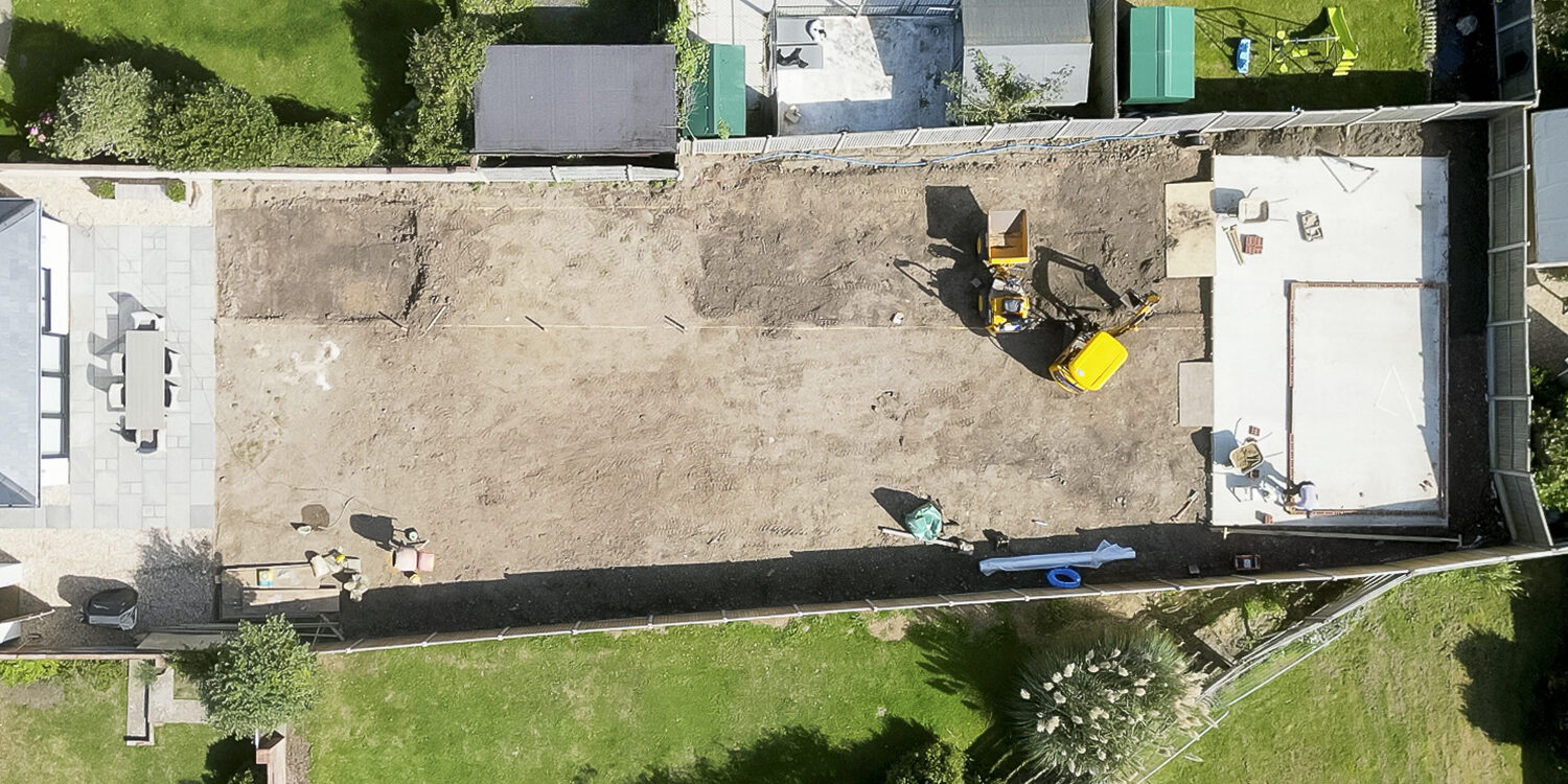 The garden will incorporate lots of natural stone/textures, seating areas, and raised planters